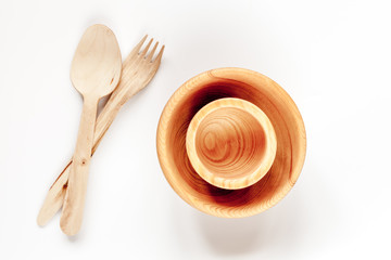 wooden kitchen utensils on white background top view