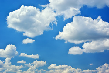 Deep blue sky on sunny day with clouds