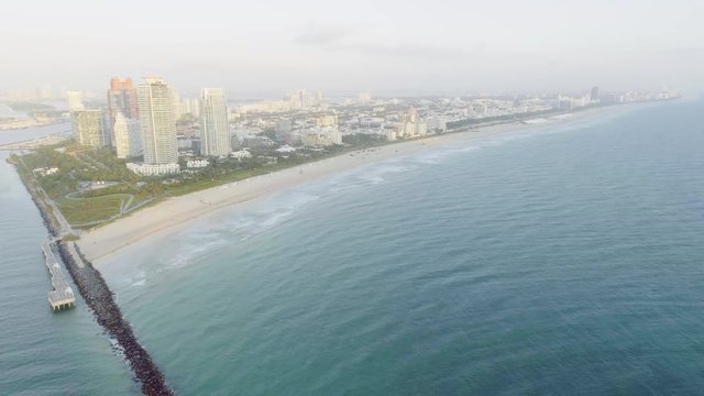Birds Eye View Timelapse of Miami South Beach Morning Sunrise Waves and Sun Spots
