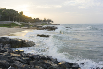 Mui Ne beach, Vietnam, a beautiful beach with long coastline, silver sand and huge waves, in an early morning