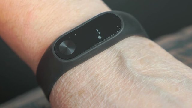 The smart band with display touchpad and heart rate monitor. Fitness tracker