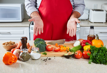 Chef man cooking in the kitchen.