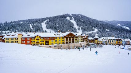 Skiing in a Winter Landscape to the Alpine Village of Sun Peaks in the Shuswap Highlands of central British Columbia, Canada