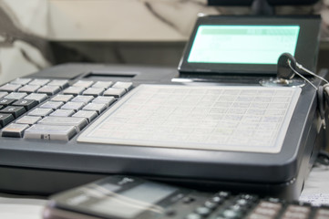 Soft focus Of Cash Register With Printed Receipt