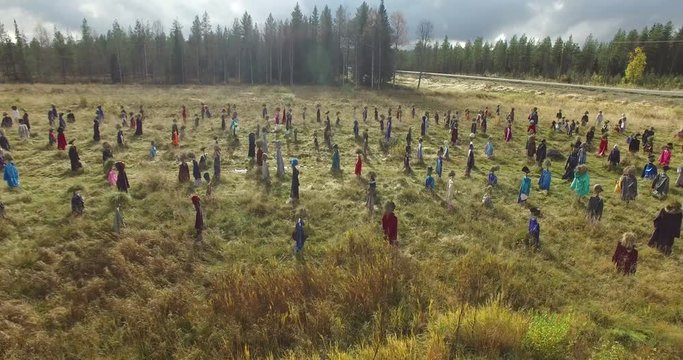 Cinema 4k circling aerial view of the silent people field, in suomussalmi, Pohjois-Pohjanmaa, Finland