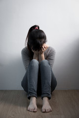 depression woman sit on floor