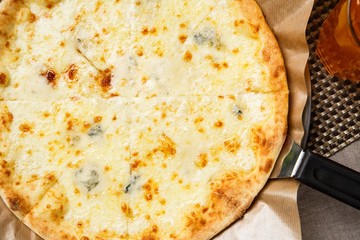 Gorgonzola pizza on table