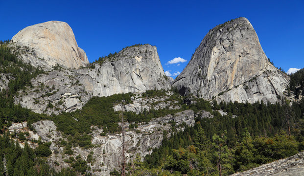Half Dome (south face), Mount Broderick, and Liberty Cap. Photographed from the John Muir Trail, Yosemite National Park, California.