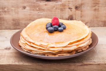 Crepes with honey and berries
