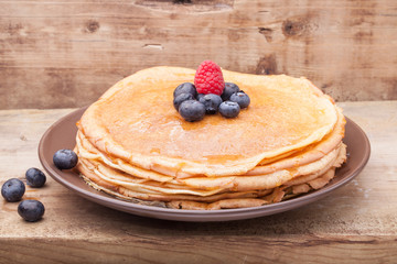 Crepes with honey and berries