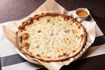 Gorgonzola pizza on table