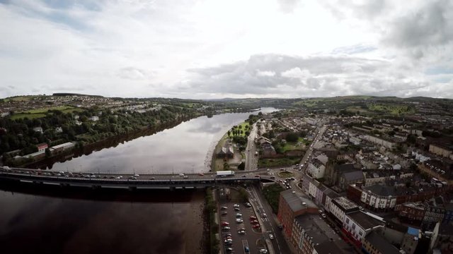 Aerial view of Derry with rooftops and River Foyle