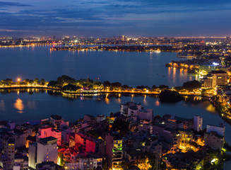 Aerial view of Hanoi skyline at West Lake ( Ho Tay in Vietnamese), at twilight