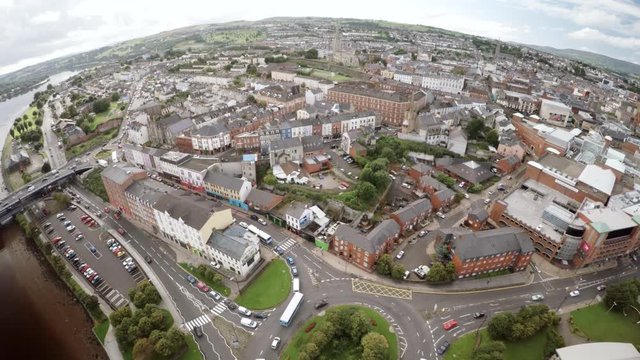 Aerial view of Derry with rooftops and River Foyle
