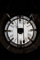 Old wall clock - mechanism inside, vertical