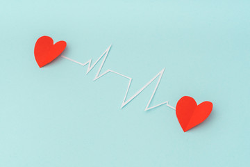 Paper cut of cardiogram of heart rhythm for Valentines Day .
