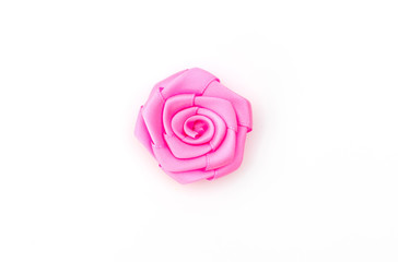 Rose flower of ribbon on white background  .