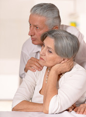 upset mature couple