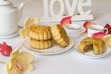 Moon cake, food for Vietnamese mid autumn festival. Focus on moon cake and others are blurred