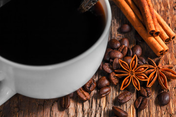Coffee cup and saucer on a wooden table.