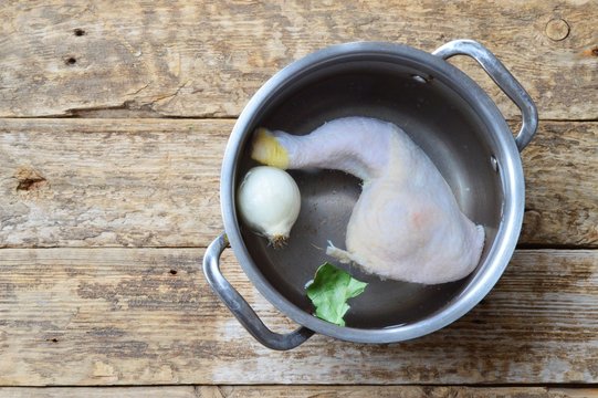 Chicken broth in a saucepan