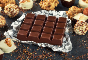 Chocolate bar with a variety of chocolate candies