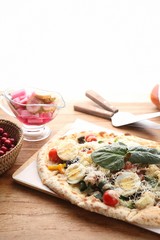 arugula  pizza on table