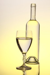 bottle of wine  and a glass 