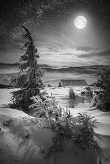 Moon rise at Christmas winter night. Black and white