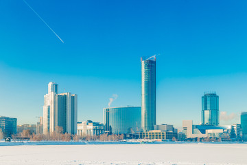 Fototapeta na wymiar Embankment in Yekaterinburg winter on a sunny day