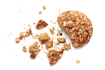 Cookies covered with nuts and raisins isolated on white background