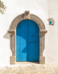 a door with typically marine colors photographed during an excursion to Panarea, a Sicilian island...