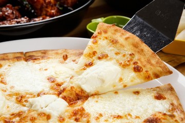 Quattro Formaggi pizza on dish