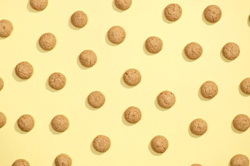 Pattern of cookies on a yellow background