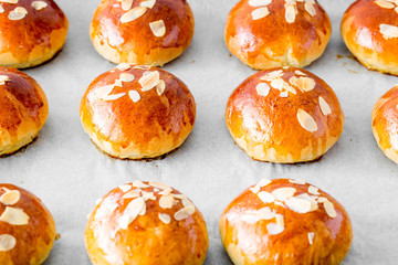 Fresh baked homemade buns on the table for breakfast Baking traditional Swedish semla bread