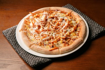 potato pizza on table