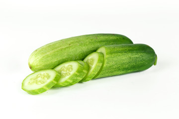 fresh sliced cucumber on white background, raw organic vegetable