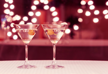 Pair of classic martini drinks on a restaurant bar. 