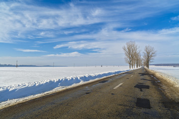 Winter landscape with a road in Romania
