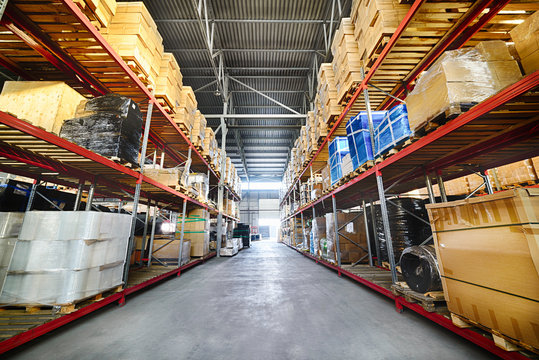 Long shelves with a variety of boxes and containers.