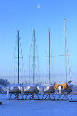 Yachts on winter storage in the early morning