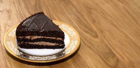 piece of chocolate cake on a beautiful platter