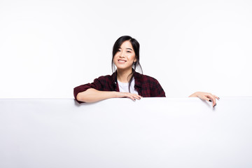 asian woman behing a white empty board