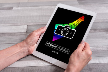 Pictures sharing concept on a tablet