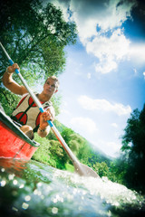 Young Man Canoeing
