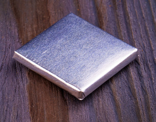 chocolates wrapped in foil isolated on white background