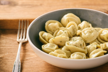 Dumplings stuffed with meat - pelmeni (russian food).