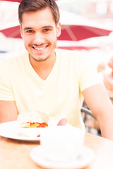 Young Man Having A Good Day Out In The City