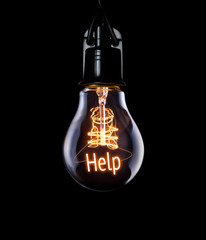 Hanging lightbulb with glowing Help concept.