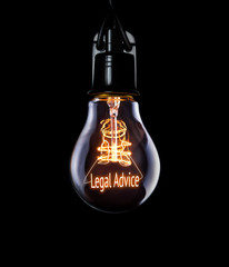 Hanging lightbulb with glowing Legal Advice concept.